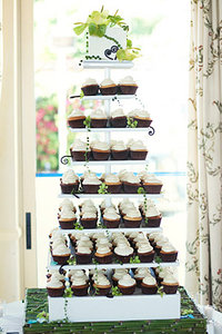 All White Cupcake Tower with Whimsical Accents  