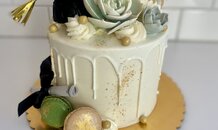 Grad Cake with Succulent Decor 